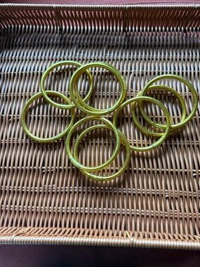 Set of 9 gold Bangles ( rubber) water resistant , won’t tarnish. Size medium